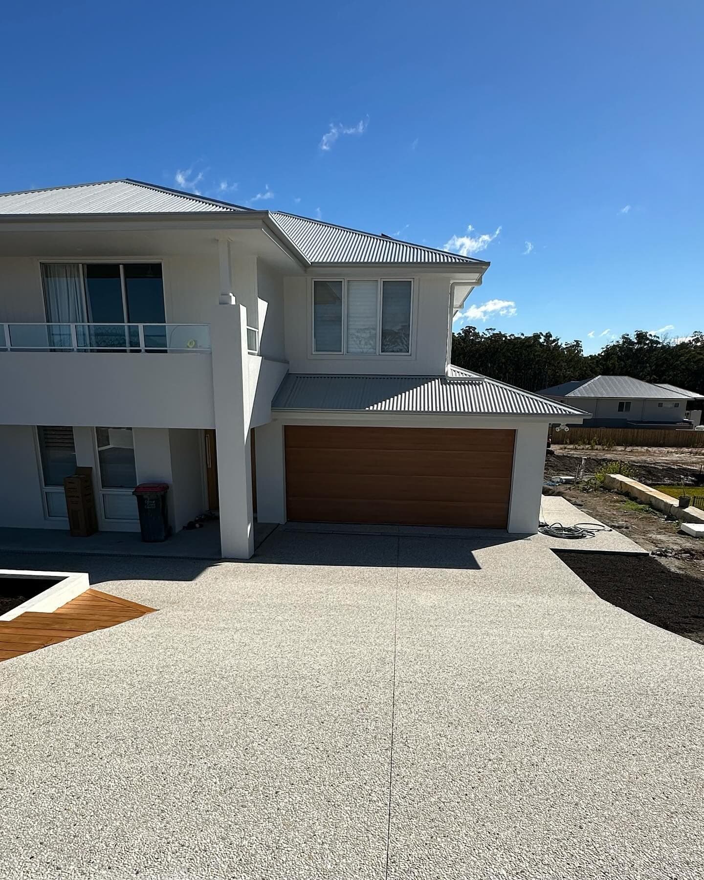 Cowra white driveway and the two-storey facade