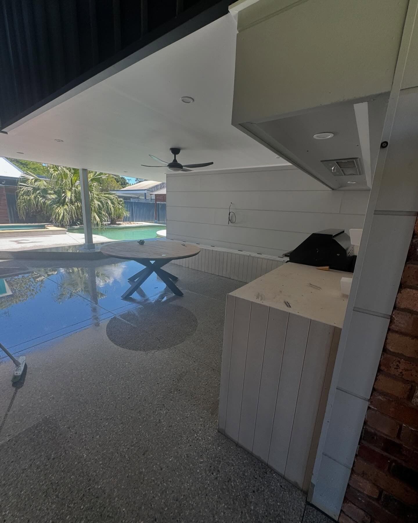 Honed alfresco floor running out to the pool, Norah Head