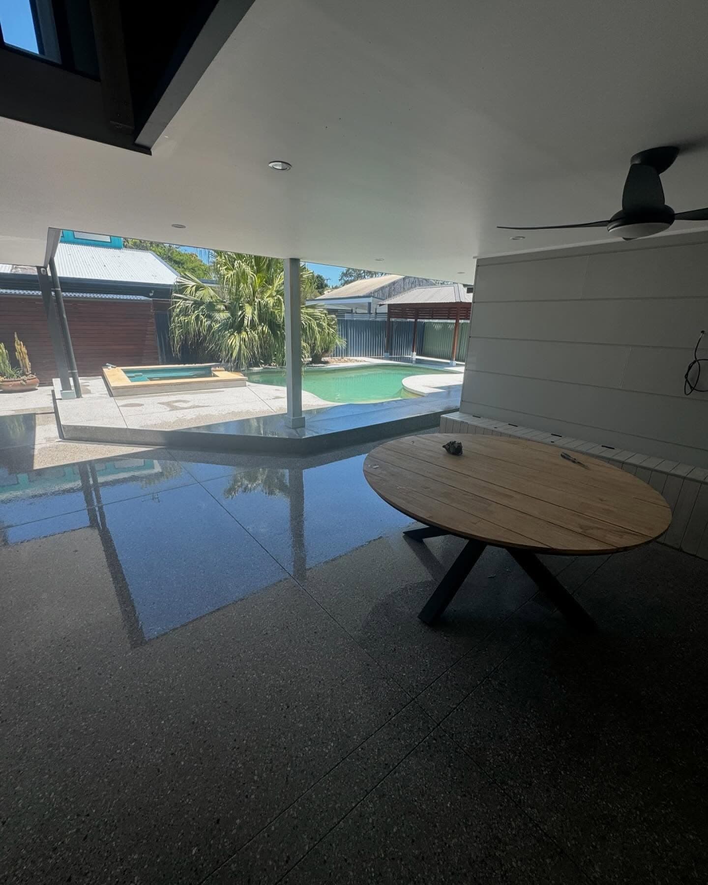 Honed concrete floor with the pool beyond, Norah Head