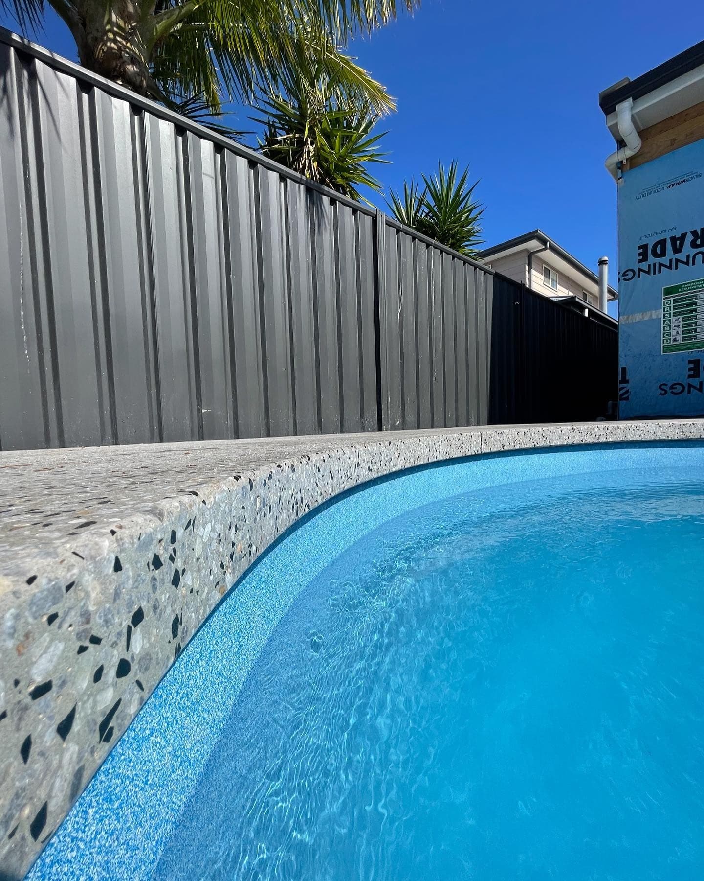 Exposed-aggregate pool surround