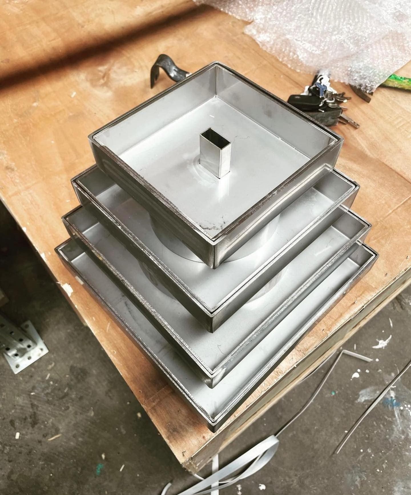 Stainless-steel skimmer lids in four sizes